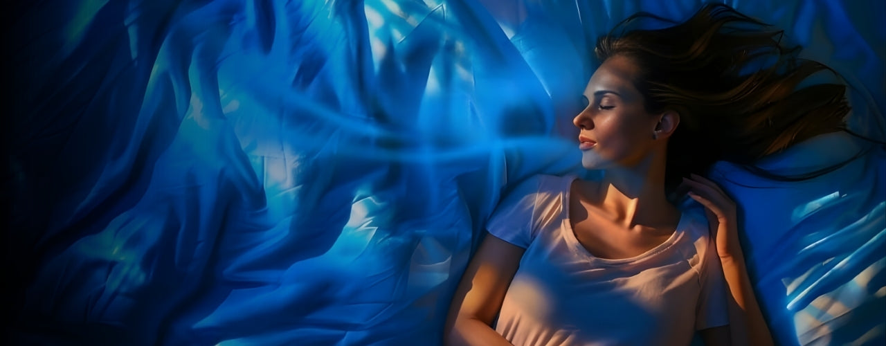 A woman resting on blue bedding in the Best of Both sleep campaign